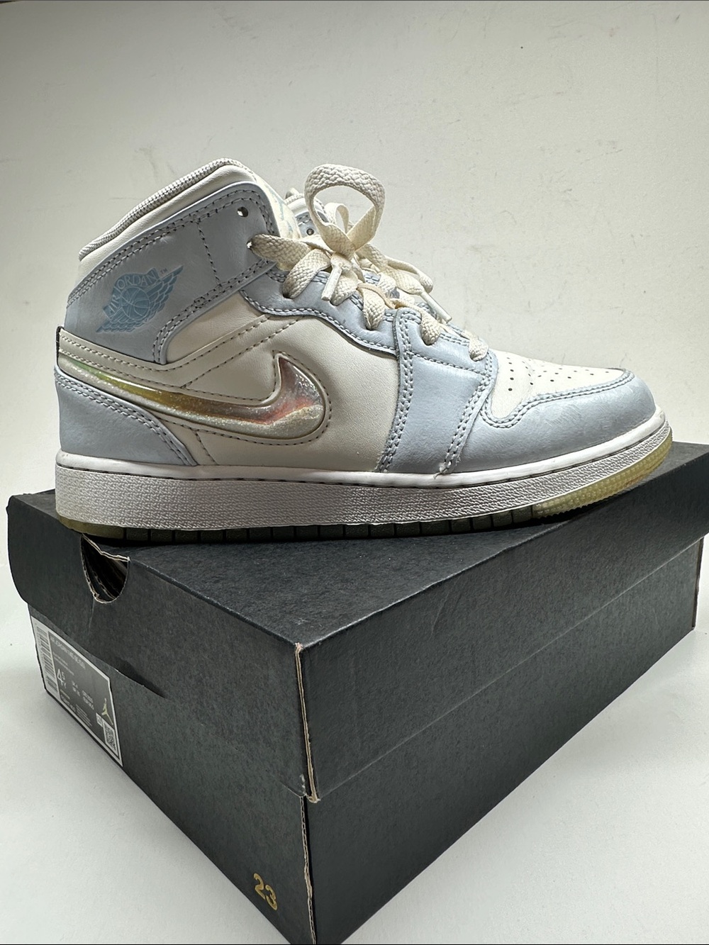 Air Jordan Kids Mid-Top Sneakers in White and Light Blue with Iridescent Swoosh